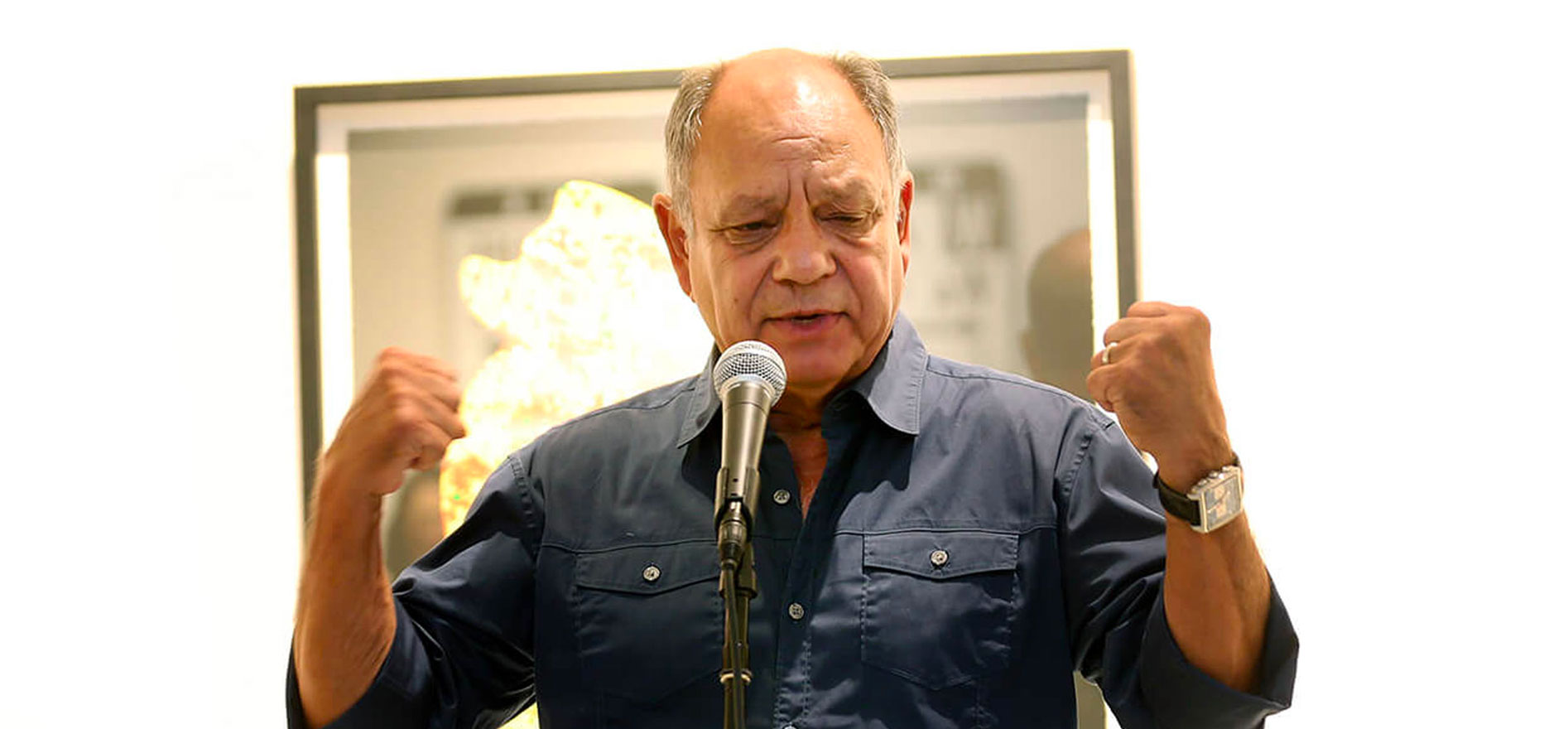 Cheech Marin speaking at the Richard Duardo art exhibit.