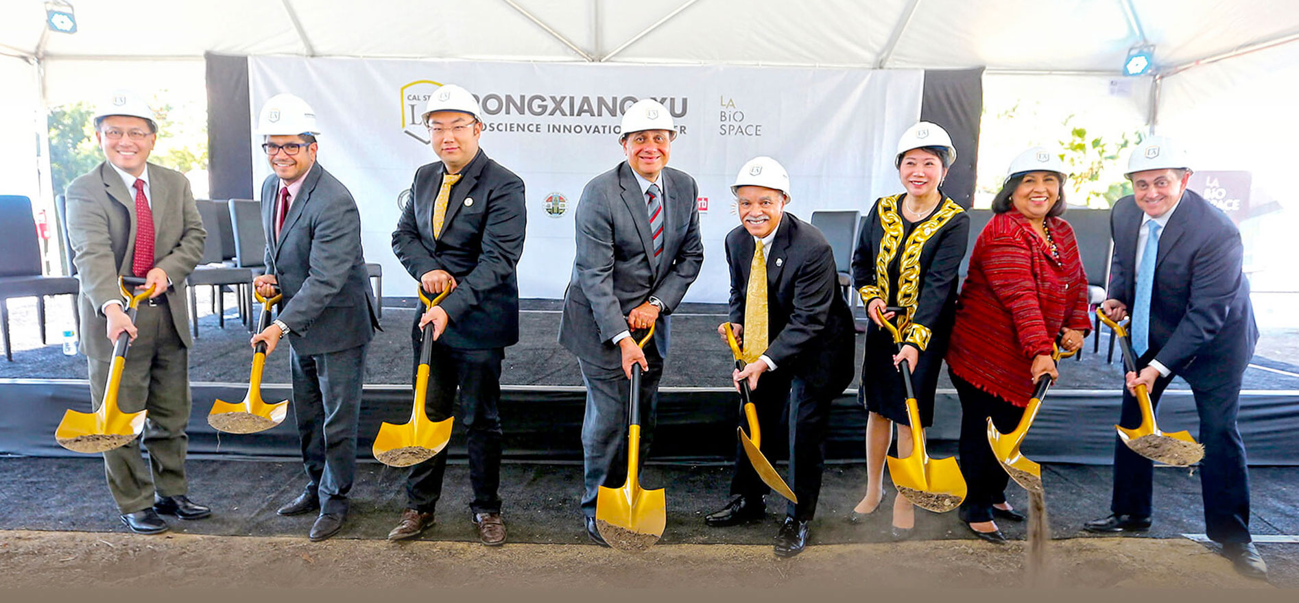 President Covino participating in the ground breaking event for the Rongxiang Xu College.