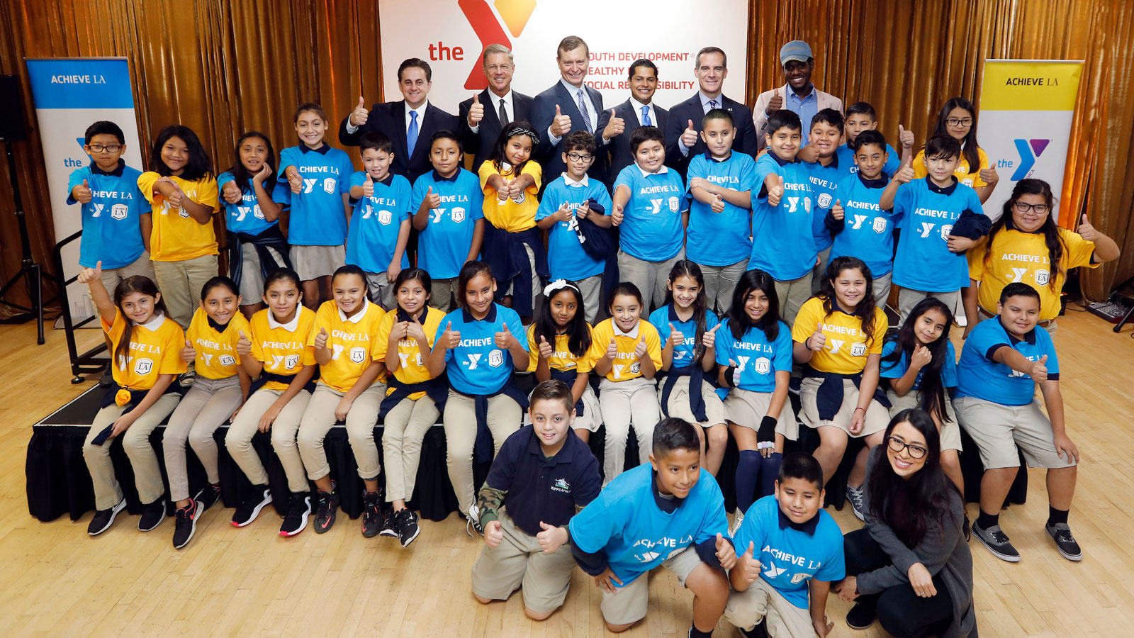 Students with Mayor Eric Garcetti, Assemblymember Miguel Santiago, Cal State LA Executive Vice President Jose A. Gomez, and YMCA of Metropolitan Los Angeles and CEO Alan C. Hostrup. Students with Mayor Eric Garcetti, Assemblymember Miguel Santiago, Cal State LA Executive Vice President Jose A. Gomez, and YMCA of Metropolitan Los Angeles and CEO Alan C. Hostrup.