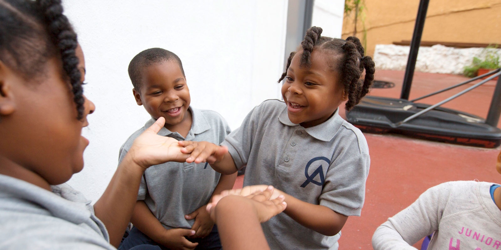 Crete Academy students playing together at Crete Academy. Students playing together during recess at Crete Academy.