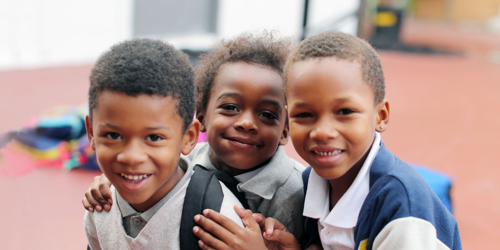 Students at Crete Academy. Group of three students at Crete Academy.