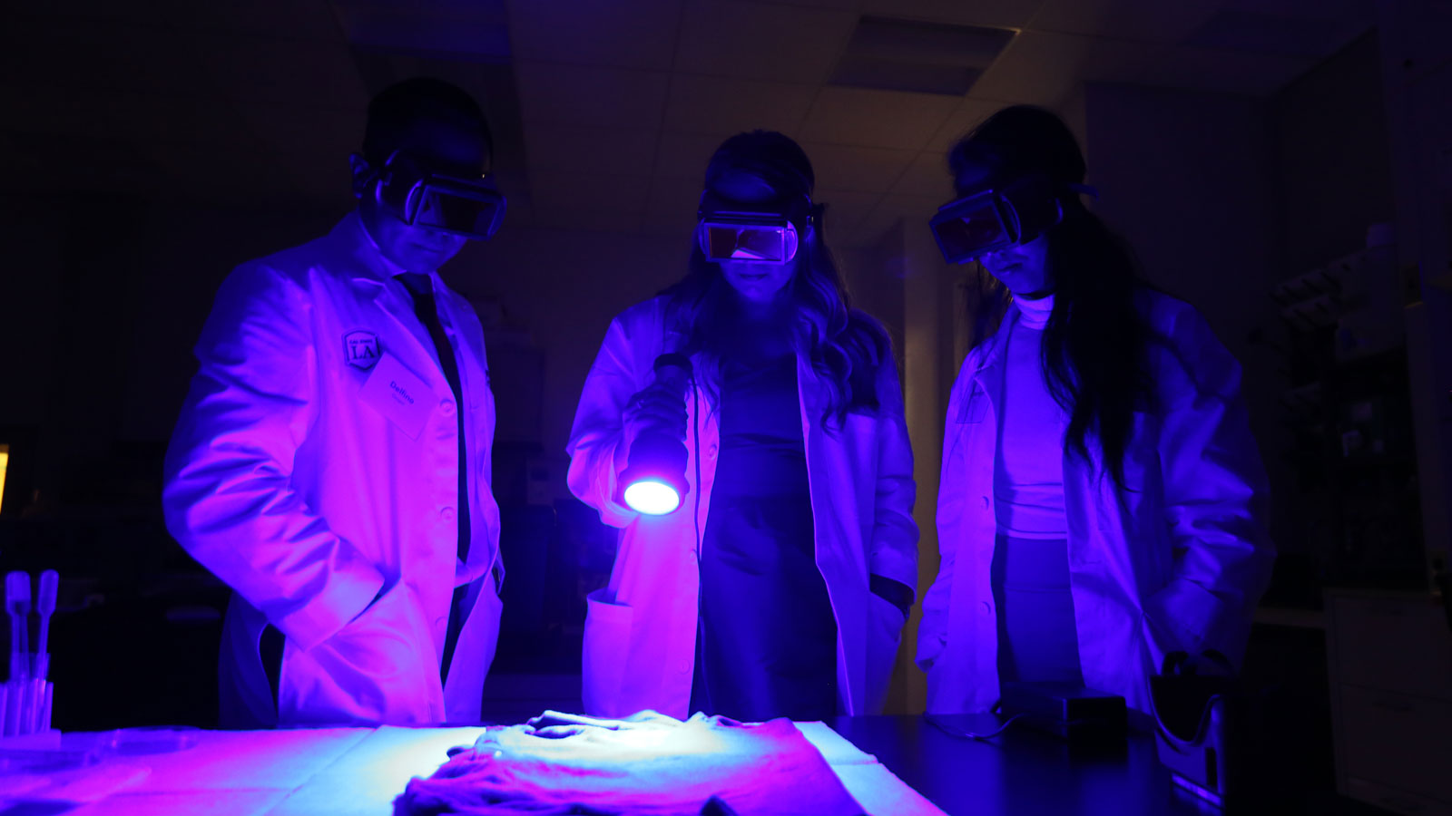 Students demonstrate Luminol tests that reveal previously hidden traces of blood. Students demonstrate Luminol tests that reveal previously hidden traces of blood.