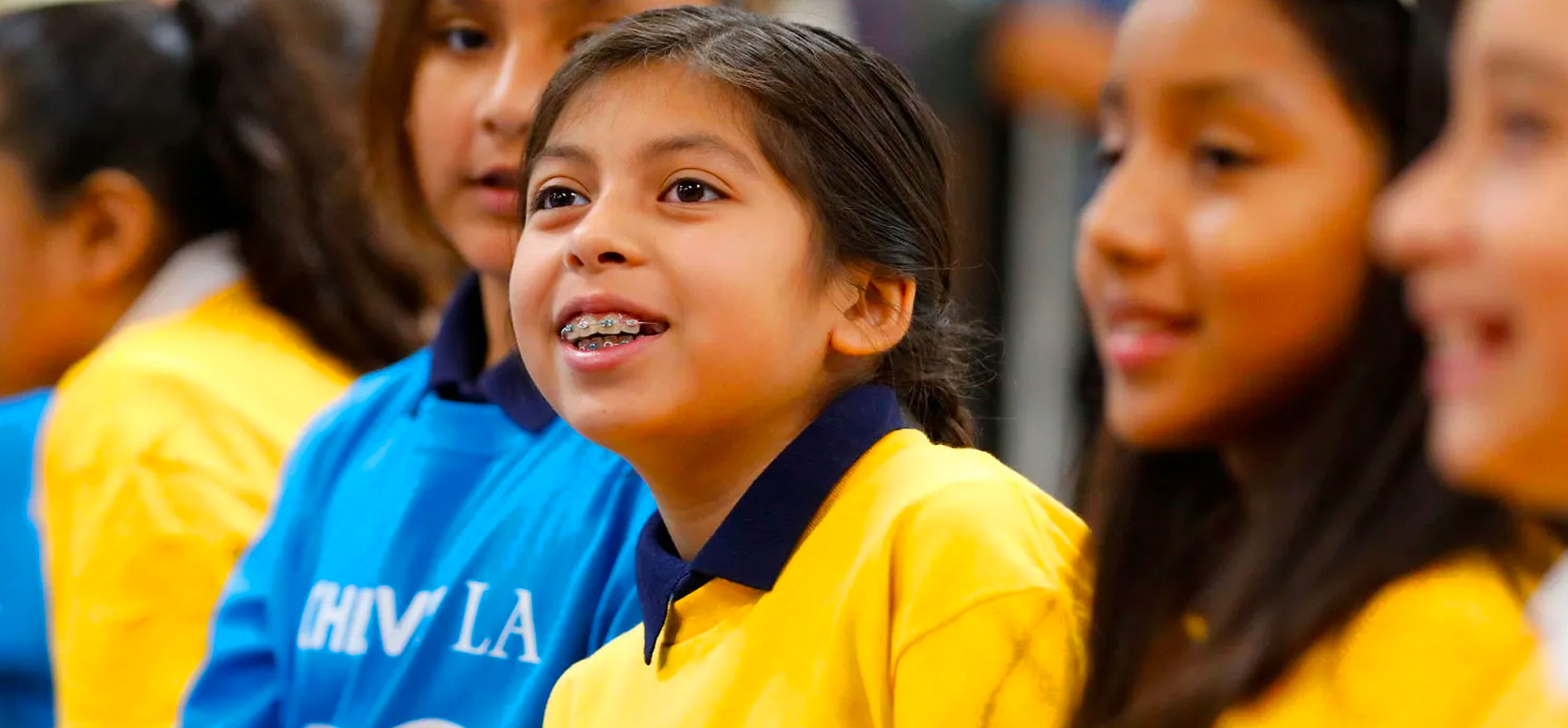 Students listen as Mayor Eric Garcetti announces Achieve LA.