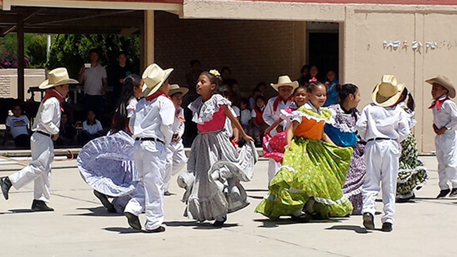 Students dancing traditional mexican dances