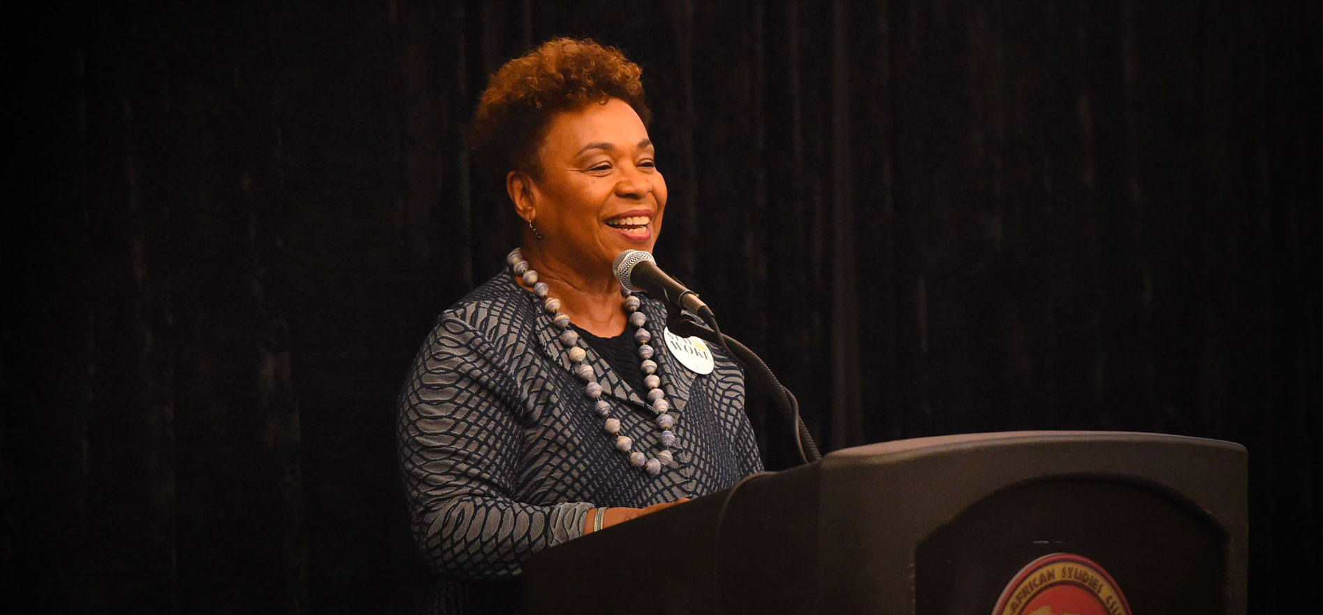 U.S. Rep. Barbara Lee speaks from a podium.
