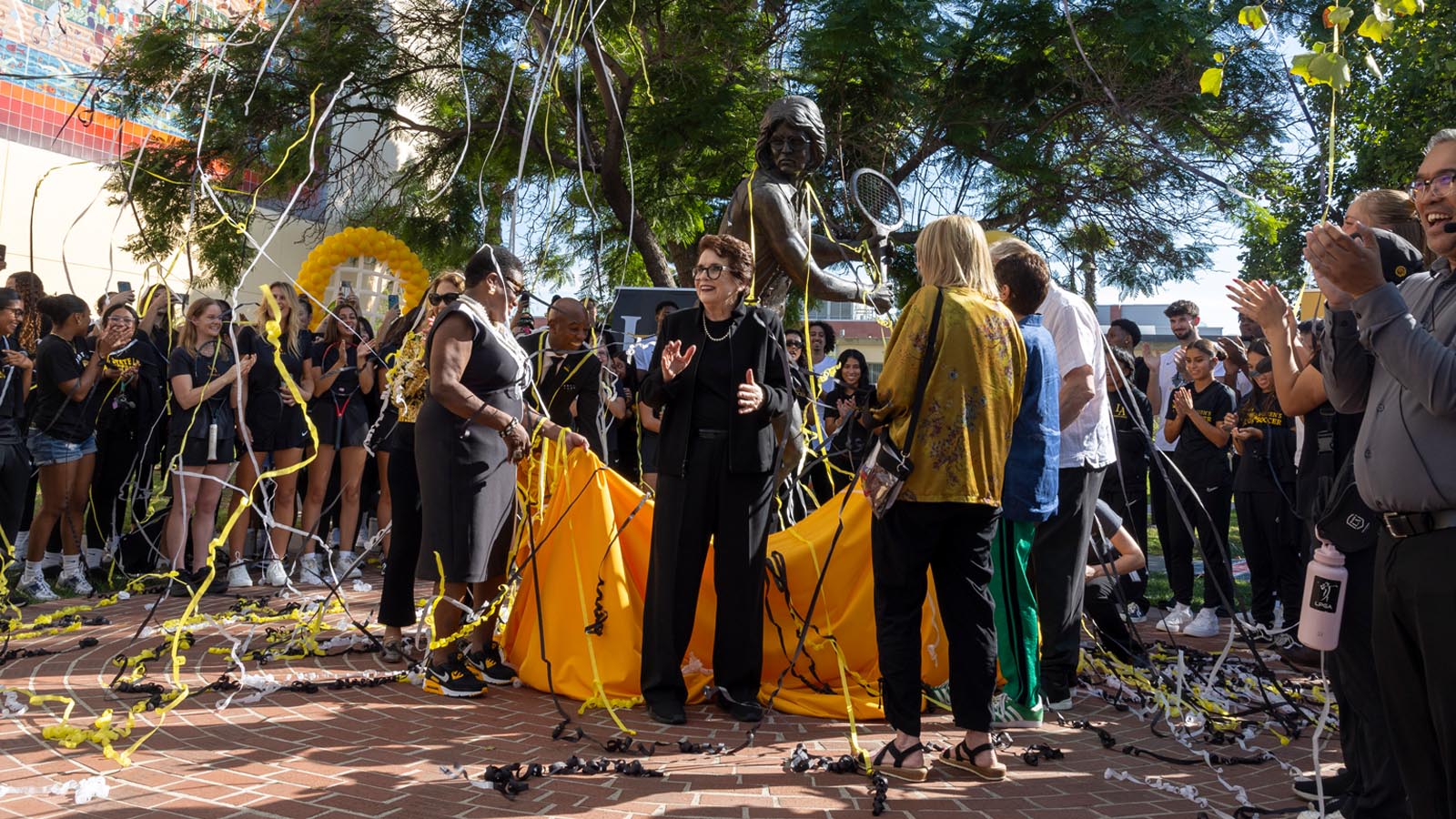 Cal State LA community celebrates the unveiling of the Billie Jean King statue with students, faculty, and guests gathered on campus during the dedication ceremony.