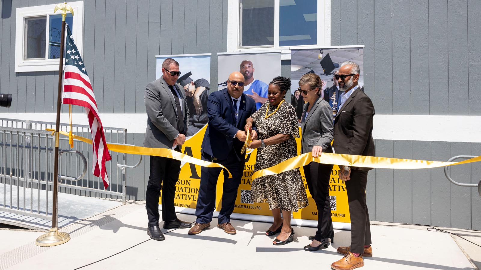 Cal State LA President Berenecea Johnson Eanes joins officials for a ribbon-cutting ceremony celebrating the expansion of the Prison Graduation Initiative at Lancaster State Prison.