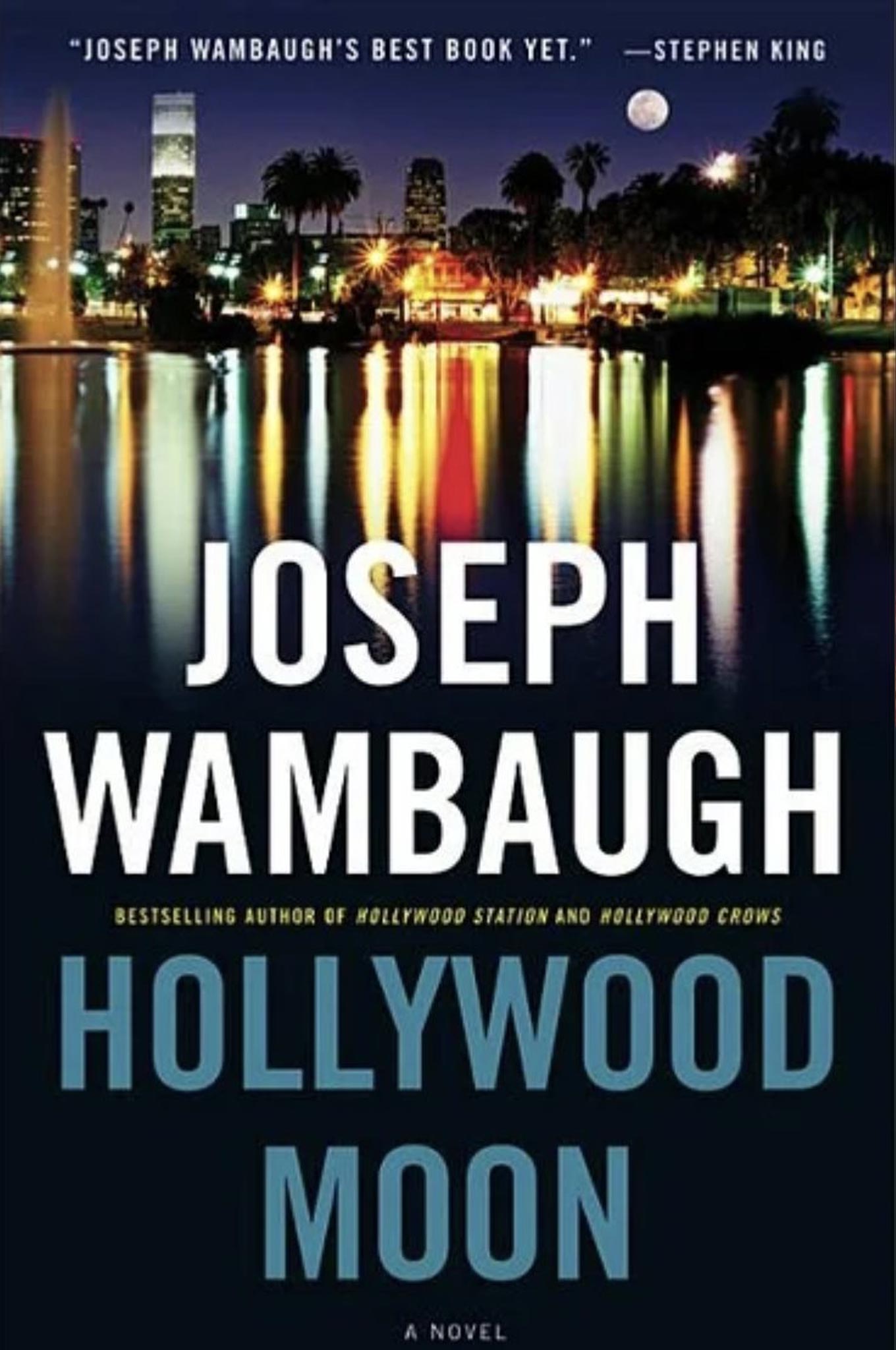 Cover of Hollywood Moon by Joseph Wambaugh, featuring the Los Angeles skyline reflected in water under a night sky.